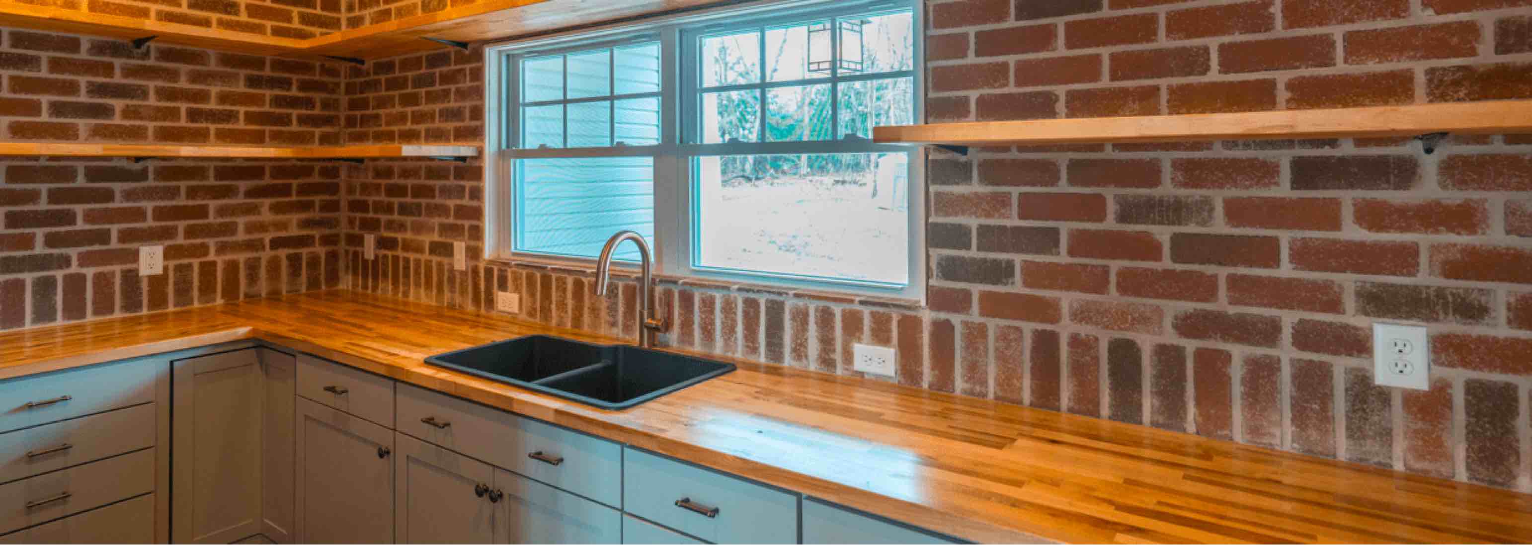 Mother in law kitchen with brick interior